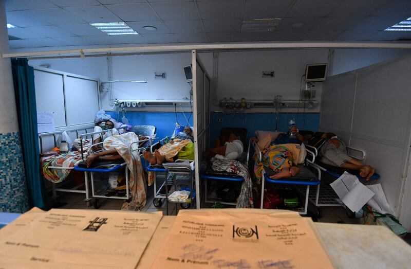 Tunisian Covid-19 patients receive treatment at the Charles Nicolle hospital's emergency room in the capital Tunis. AFP