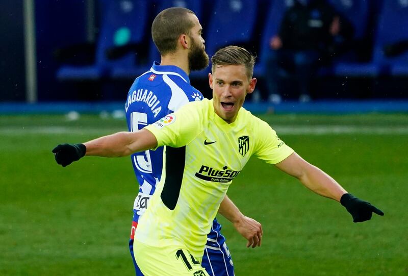 Atletico Madrid's Marcos Llorente celebrates scoring their first goal. Reuters