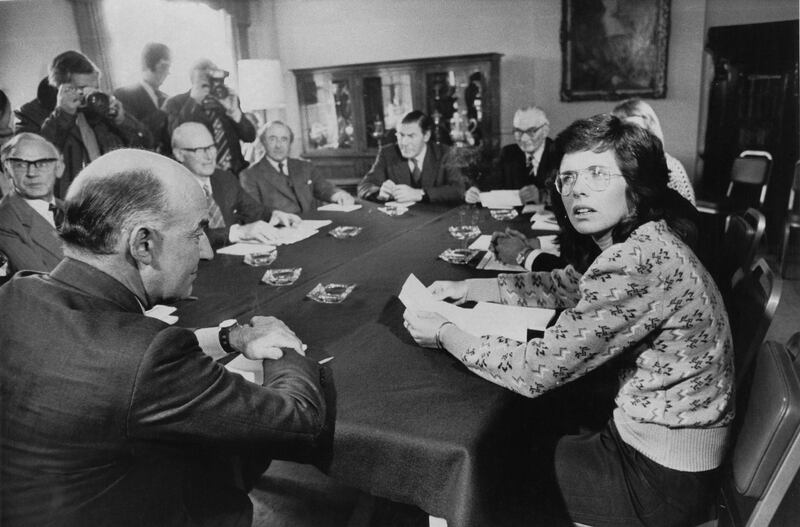 American tennis player Billie Jean King (right), President of the Women's Tennis Association (WTA), at a meeting with a committee of the the All England Lawn Tennis Club to discuss more equal prize money for male and female tennis players, Wimbledon, London, 26th February 1975. The meeting resulted in an increase in prize money for women from 70 to 80 percent of men's prizes and the promise of an annual review. (Photo by Frank Tewkesbury/Evening Standard/Hulton Archive/Getty Images)