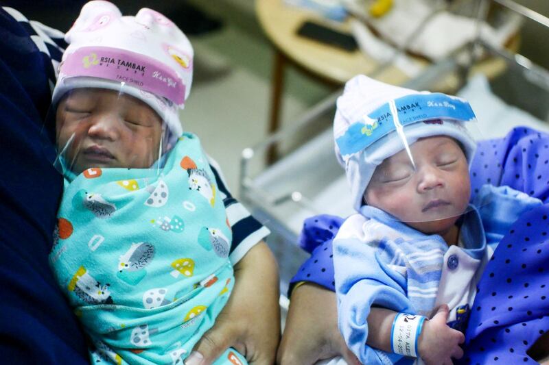 Newborn babies are seen in a hospital wearing protective face shields amid the coronavirus disease (COVID-19) outbreak in Jakarta, Indonesia. Reuters