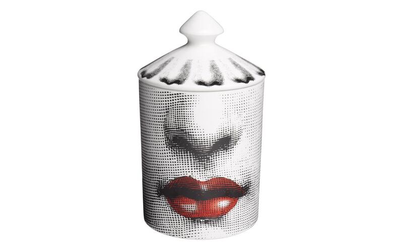 Scented candle, Dh725, Fornasetti at Ounass . Courtesy Ounass