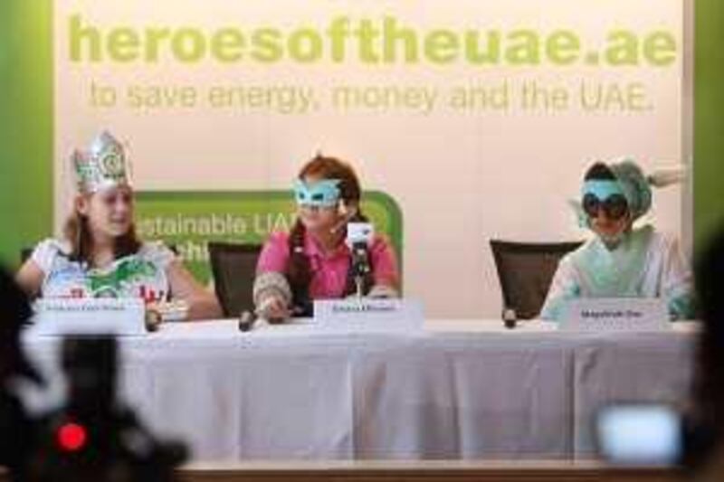February 17, 2009 / Abu Dhabi / Heroes of UAE Princess Cool Rinse, left,  Electra Efficient and MegaWatt Boy in association with the Emirates Wildlife Society and the Worldwide Fund for Nature announce a new campaign aimed at creating general understanding and elicit action from people living in the UAE to the country's high ecological footprint and energy consumption habits in February 17, 2009.  (Sammy Dallal / The National) *** Local Caption ***  sd-021709-energy-06.jpg