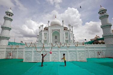 Children in front of a replica of the Taj Mahal at a fairground in Bengaluru. The city is leading a tourism boom. Reuters