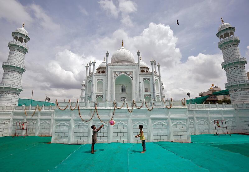 Children in front of a replica of the Taj Mahal at a fairground in Bengaluru. The city is leading a tourism boom. Reuters