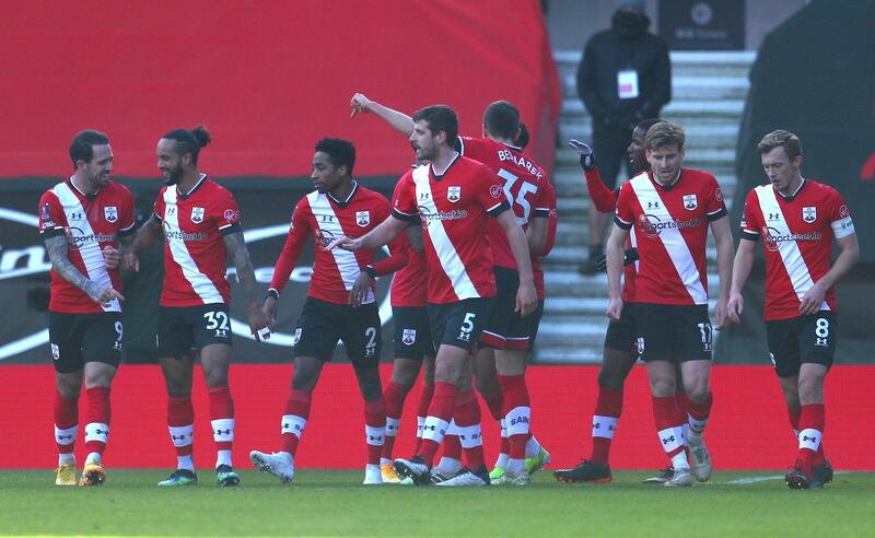 Danny Ings, Theo Walcott, Kyle Walker-Peters, Jack Stephens, Stuart Armstrong and James Ward-Prowse celebrate the only goal. Getty