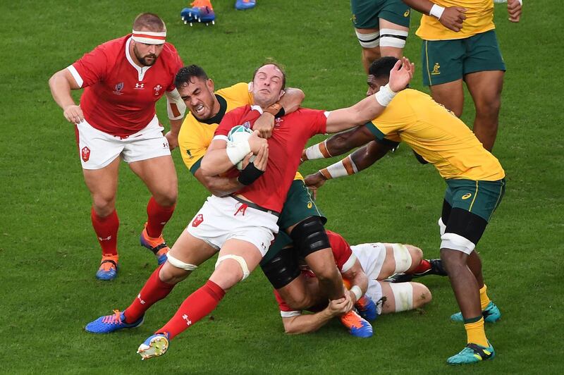 Wales lock Alun Wyn Jones is tackled by Australia's Rory Arnold at the Tokyo Stadium on Sunday. AFP