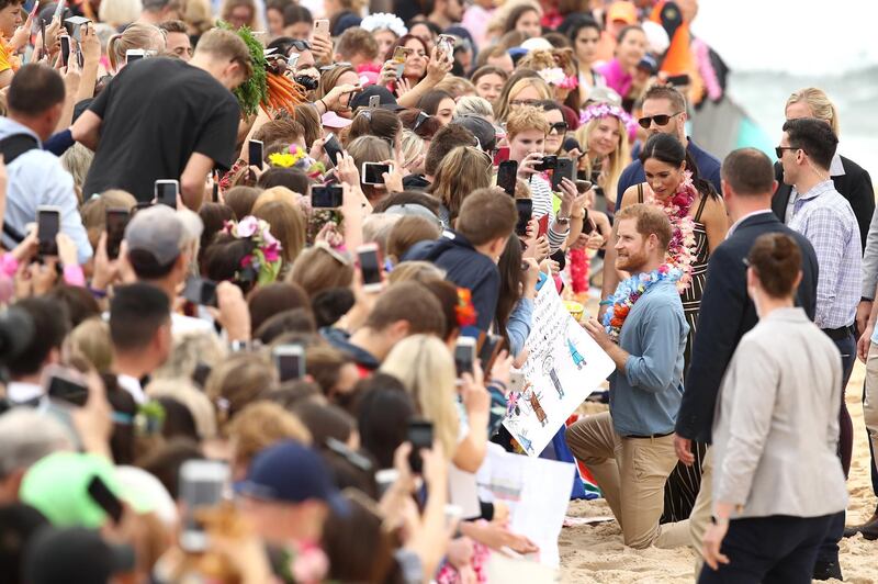 Prince Harry and Meghan meet members of the public at Bondi Beach. Getty Images