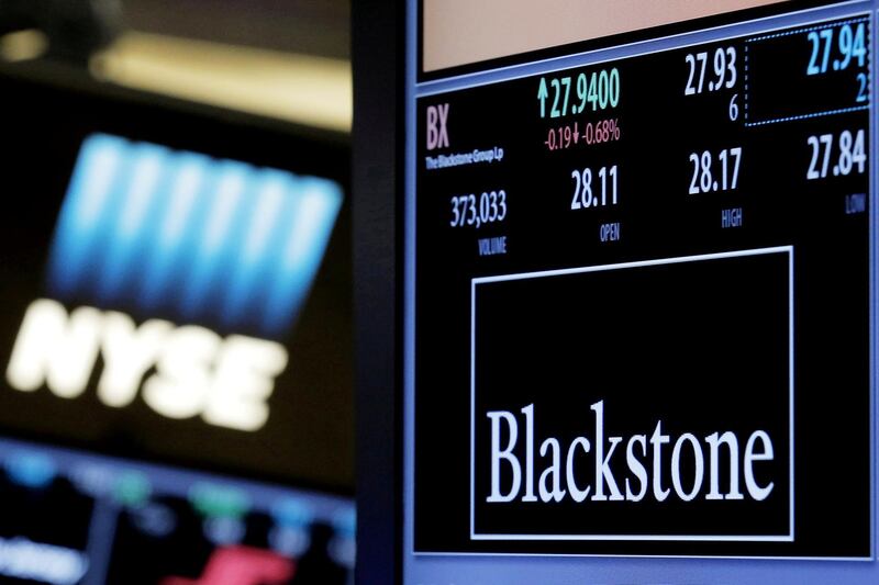 FILE PHOTO: The ticker and trading information for Blackstone Group is displayed at the post where it is traded on the floor of the New York Stock Exchange (NYSE), New York, NY, U.S., April 4, 2016. REUTERS/Brendan McDermid/File Photo