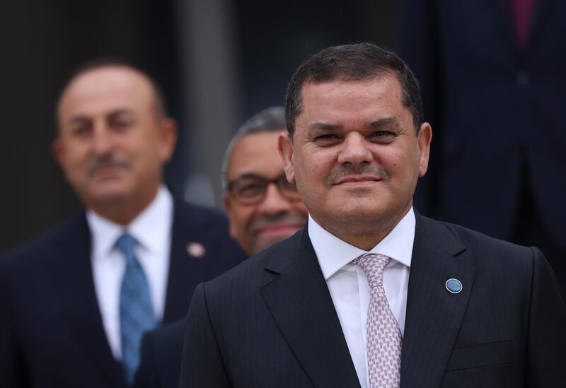 Libyan Prime Minister Abdul Hamid Dbeibah and Turkish Foreign Minister Mevlut Cavusoglu attend the second international Libya conference in Berlin, Germany. EPA