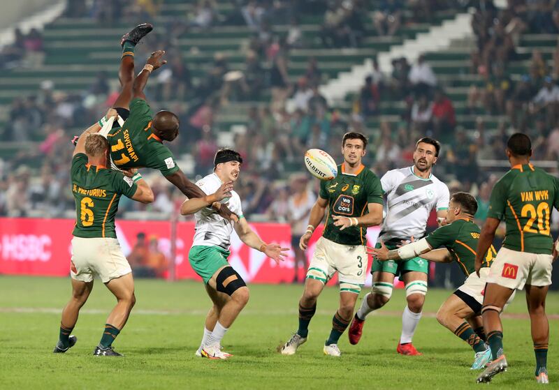 South Africa's Siviwe Soyizwapi and Aaron O'Sullivan of Ireland battle for the ball. 