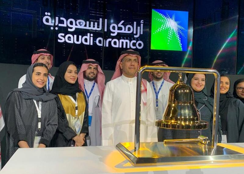 Participants attend the official ceremony marking the debut of Saudi Aramco's initial public offering (IPO) on the Riyadh's stock market, in Riyadh, Saudi Arabia. Reuters