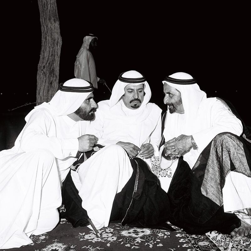 Archival photograph from Al Ittihad. 1980 -  Sheikh Zayed visits the Northern Emirates. (Ittihad folder caption)

 Courtesy Al Ittihad. Left-right Mohhmed bin Rashid Al Maktoum, Sheikh Hamdan bin Mohammed Al nahyan and Sheikh Rashid. 