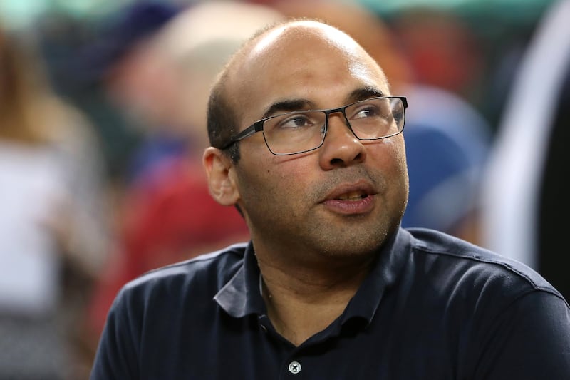 PHOENIX, AZ - AUGUST 09:  General manager Farhan Zaidi of the Los Angeles Dodgers in the dugout before the MLB game against the Arizona Diamondbacks at Chase Field on August 9, 2017 in Phoenix, Arizona.  (Photo by Christian Petersen/Getty Images)