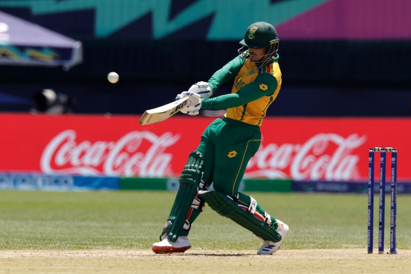 Quinton de Kock hits a six as he top-scored for South Africa with 20 off 27 balls. AP