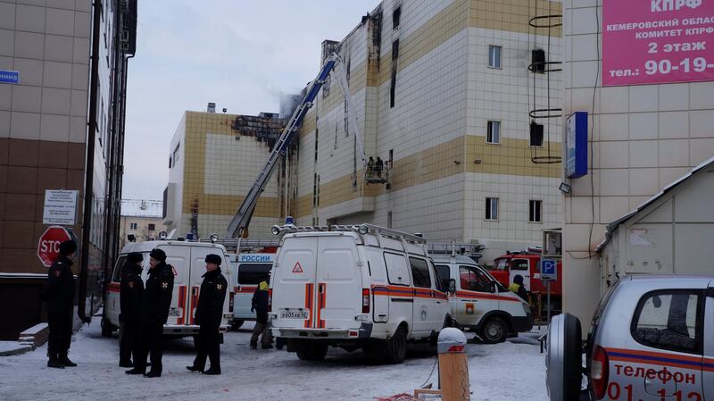 Members of the Emergency Situations Ministry work to extinguish a fire in a shopping mall in the Siberian city of Kemerovo, Russia March 26, 2018. Russian Emergencies Ministry/Handout via REUTERS. ATTENTION EDITORS - THIS IMAGE WAS PROVIDED BY A THIRD PARTY. NO RESALES. NO ARCHIVE.