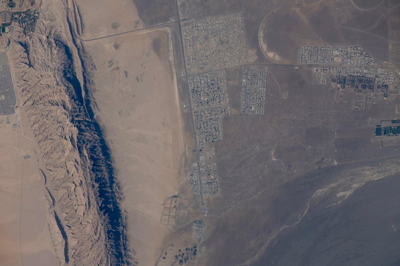 Hazza Al Mansouri took this photo of Umm Ghafa in Al Ain from the space station in 2019. It is the village where his colleague and reserve astronaut Sultan Al Neyadi grew up. Sultan Al Neyadi twitter