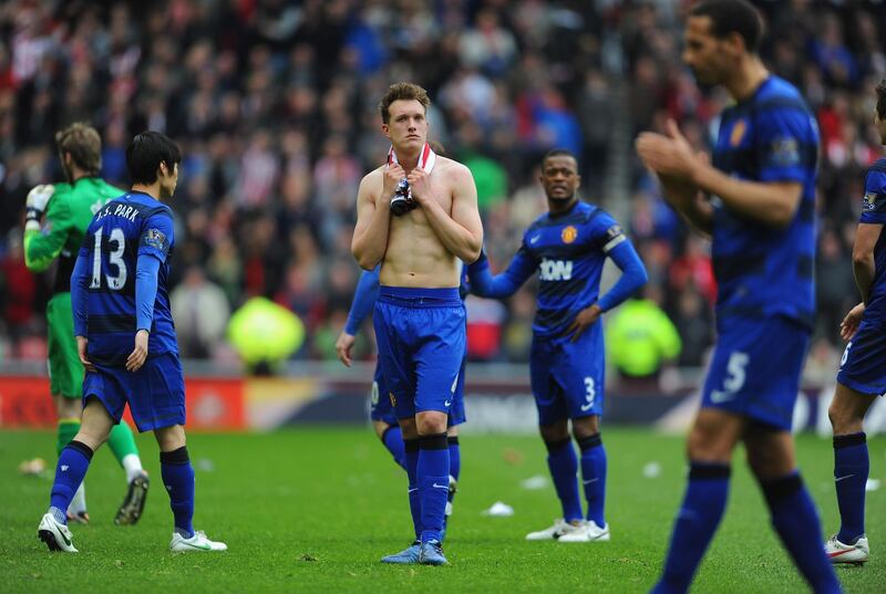 SUNDERLAND, ENGLAND - MAY 13: Phil Jones of Manchester United looks dejected during the Barclays Premier League match between Sunderland and Manchester United at the Stadium of Light on May 13, 2012 in Sunderland, England.  (Photo by Michael Regan/Getty Images)