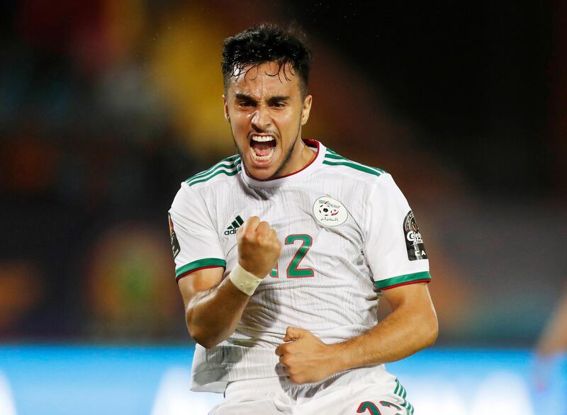 In Group C's other match on Monday, Algeria secured their place in the last 16 alongside Senegal with a 3-0 win over Tanzania. Adam Ounas celebrates scoring their second goal. Reuters