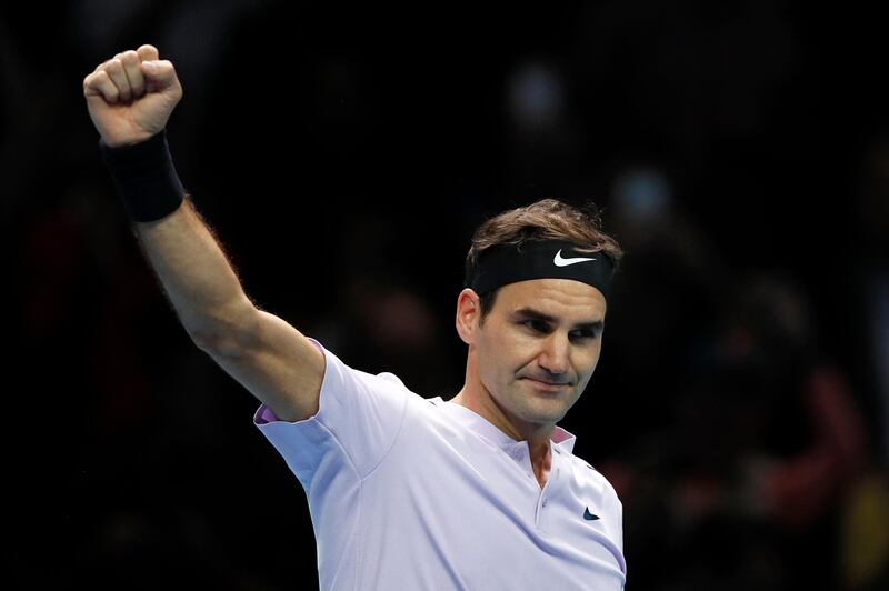 Roger Federer of Switzerland celebrates at match point after beating Jack Sock of the United States in their singles tennis match at the ATP World Finals at the O2 Arena in London, Sunday, Nov. 12, 2017. (AP Photo/Kirsty Wigglesworth)