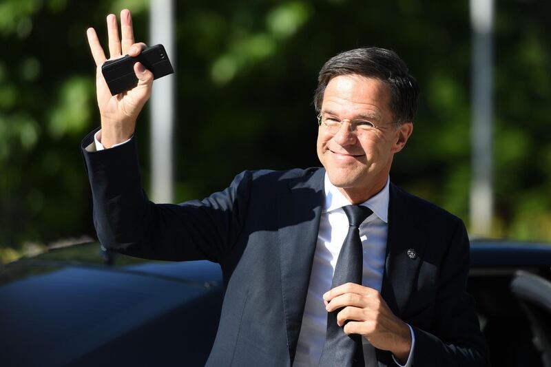 Netherlands Prime Minister Mark Rutte waves as he arrives for an EU-Western Balkans Summit in Sofia on May 17, 2018. Dimitar Dilkoff / AFP