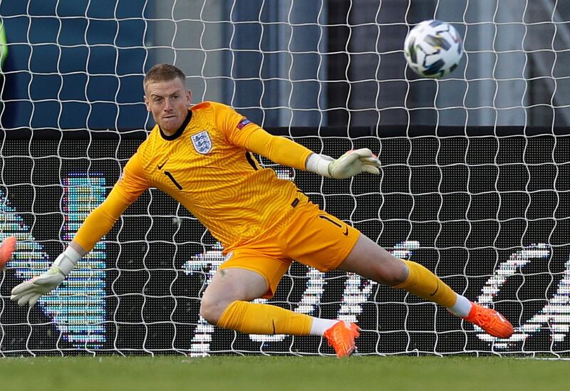 England goalkeeper Jordan Pickford watches Birkir Bjarnason's penalty sail over the bar. Reuters