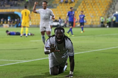 Hilal's forward Bafetimbi Gomis celebrates his goal during the AFC Champions League Round of 16 football match between Iran's Esteghlal and Saudi's Al-Hilal on September 13, 2021, at the Zabeel Stadium in Dubai.  (Photo by -  /  AFP)