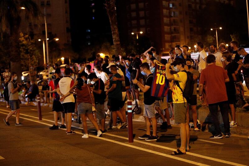 Dozens of FC Barcelona fans gather outside Camp Nou Stadium to demand the resignation of the club's president, Josep Maria Bartomeu.  EPA