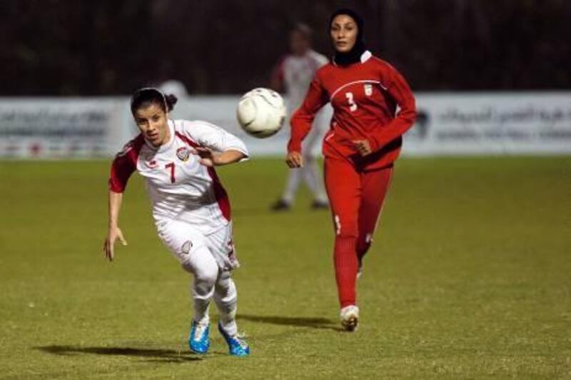 ABU DHABI, UAE - October 12, 2011-  Jamila Marek, # 7 of UAE, chases after the ball against Iran in the 4th WAFF Women's Championship held at Sultan Bin Zayed Stadium in Abu Dhabi on Wednesday October 12, 2011.  (Andrew Henderson / The National) 