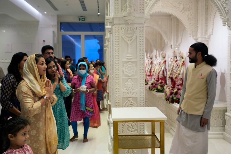Hindus pray during Diwali at the temple in Dubai. AP