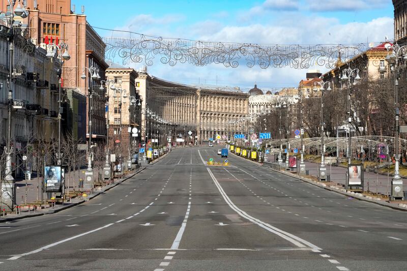Khreshchatyk, Kiev’s main street, lies empty as a curfew comes into effect. AP