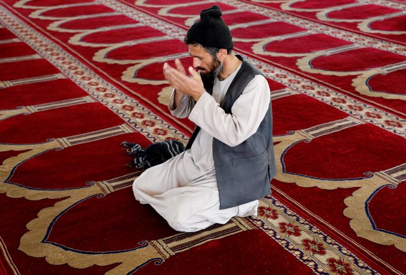 An Afghan man prays at a mosque during the holy month of Ramadan in Kabul, Afghanistan. Reuters