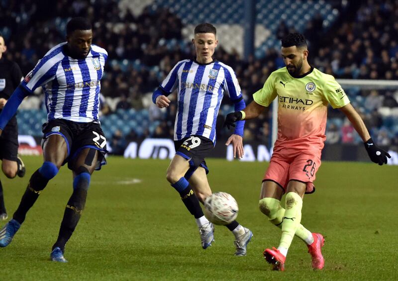 Manchester City's Riyad Mahrez, right, in action against Wednesday. AP