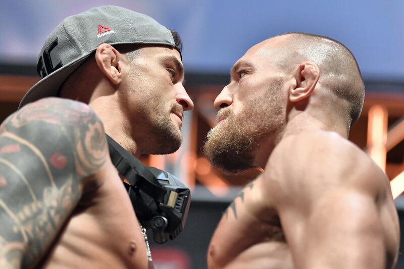 ABU DHABI, UNITED ARAB EMIRATES - JANUARY 22: (L-R) Opponents Dustin Poirier and Conor McGregor of Ireland face off during the UFC 257 weigh-in at Etihad Arena on UFC Fight Island on January 22, 2021 in Abu Dhabi, United Arab Emirates. (Photo by Chris Unger/Zuffa LLC)