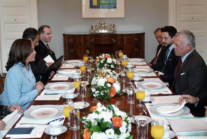 Jordanian King Abdullah II (R) accompanied by Crown Prince Hussein bin Abdullah (2-L) and US Vice President Kamala Harris (L), at the residence of the Vice President in the  Naval Observatory in Washington.