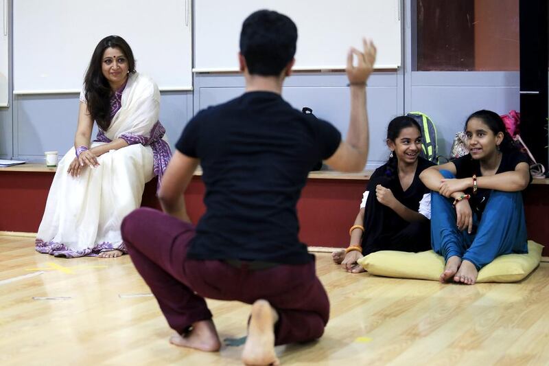 Pali Chandra, left, the kathak danseuse and artistic director, leads a rehearsal for the forthcoming Bollywood show Naach at Gurukul dance studio in Dubai. Sarah Dea / The National