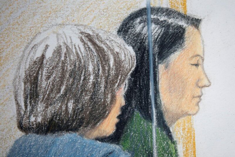 Huawei CFO Meng Wanzhou, who was arrested on an extradition warrant, appears at her B.C. Supreme Court bail hearing along with a translator, in a drawing in Vancouver, British Columbia, Canada December 7, 2018.  REUTERS/Jane Wolsak   MANDATORY CREDIT. NO RESALES. NO ARCHIVES