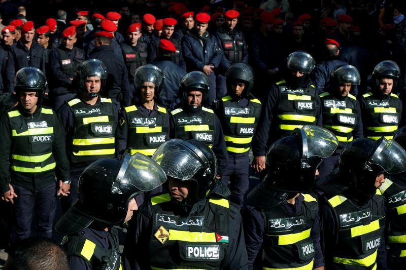 Jordanian police stand guard during a protest against a government's agreement to import natural gas from Israel, in Amman, Jordan. Reuters