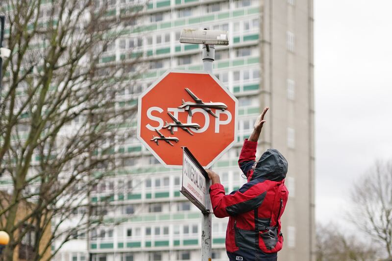 A work by Banksy is removed in Peckham, south-east London, in December 2023. Getty Images