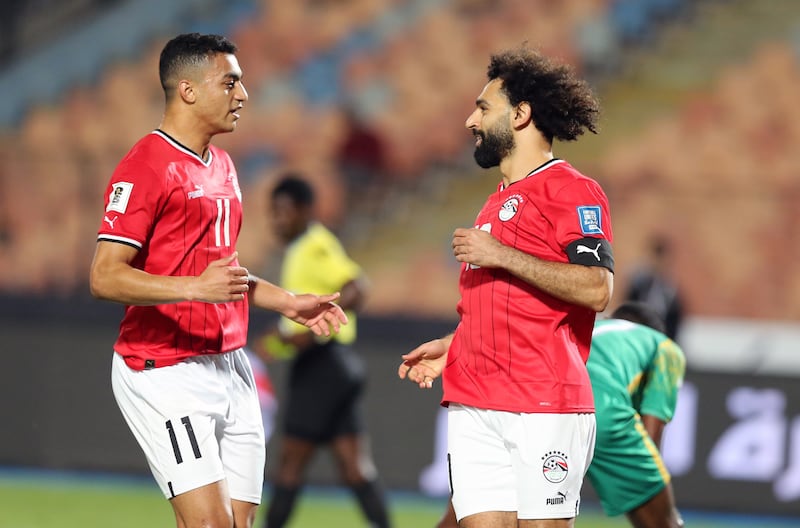 Mohamed Salah celebrates with Mostafa Mohamed after scoring a goal for Egypt. EPA