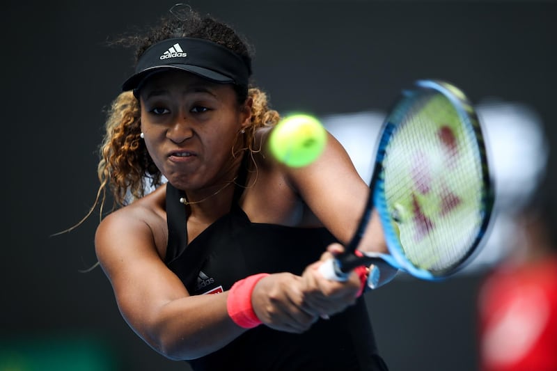 BEIJING, CHINA - OCTOBER 05:  Naomi Osaka of Japan Hits a return during her Women's Singles Quarterfinals match against Zhang Shuai of China in the 2018 China Open at the China National Tennis Centre on October 5, 2018 in Beijing, China.  (Photo by Lintao Zhang/Getty Images)