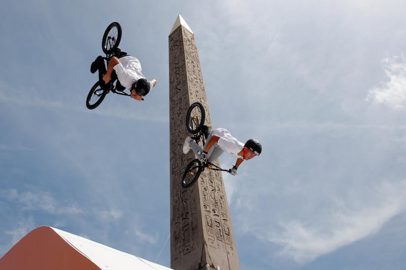 France's BMX team put on a show at Place de la Concorde, which has been turned into a giant Olympic park ahead of the Paris 2024 Olympics, in Paris, France.  Reuters