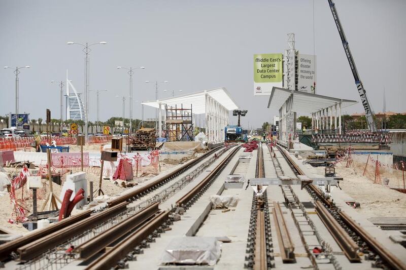 Tracks for the Al Sofouh Tram project in Dubai are being laid. The project, along with four other railway projects which the UAE is investing heavily into, is expected to benefit the national economy. Sarah Dea/The National 