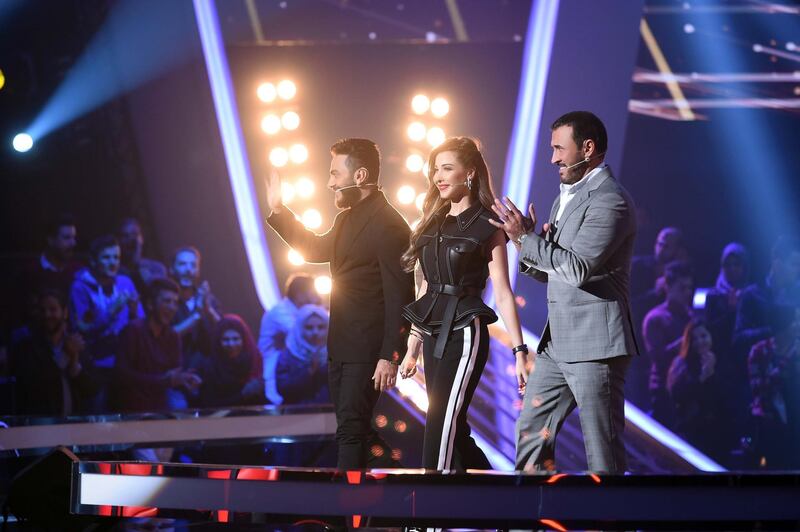 The Voice Kids coaches competing in tonight's final episode (L-R) Tamer Hosny, Nancy Ajram and Kadim Al Sahir. Courtesy MBC