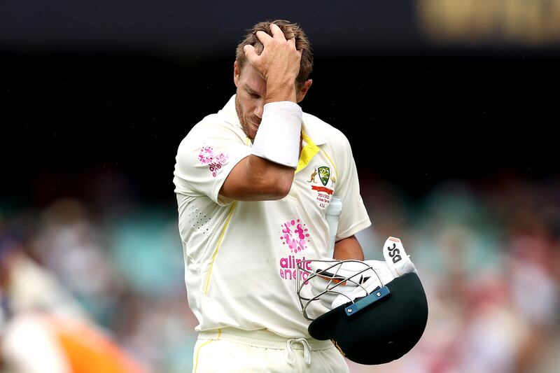 David Warner of Australia reacts to losing his wicket. Getty Images