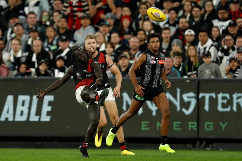 Anthony McDonald-Tipungwuti of the Bombers kicks a goal. Getty