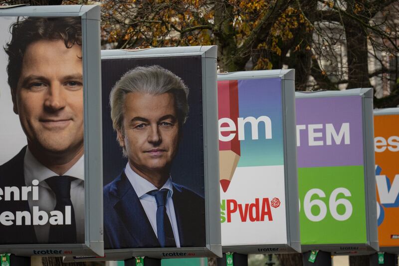 Mr Wilders on an election campaign poster near the Dutch parliament building in The Hague this month. Getty Images