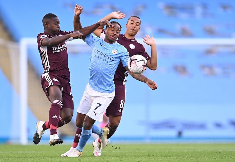Manchester City's Raheem Sterling in action against Youri Tielemans and Nampalys Mendy of Leicester. EPA