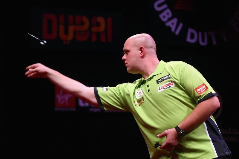 Michael Van Gerwen of the Netherlands in action at the 2015 Dubai Duty Free Darts Masters. Francois Nel / Getty Images