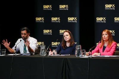 Humza Yousaf with SNP leadership rivals Kate Forbes, centre, and Ash Regan, in an on-stage debate. Getty 