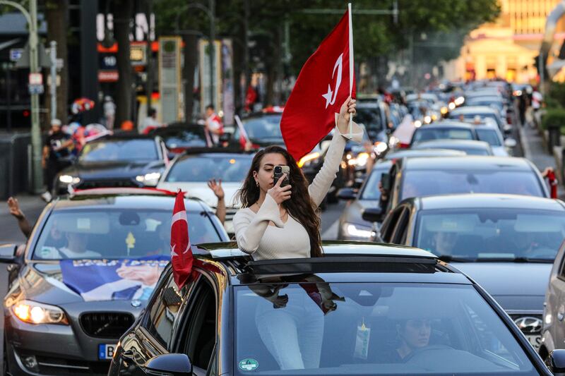 Hundreds of Erdogan supporters turned out to celebrate the election result in Berlin. Getty